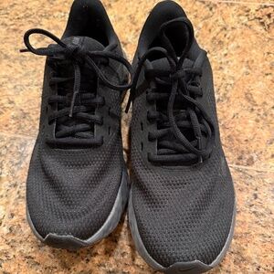 Nike Women's running shoes. These shoes say size 7 but fit like a 6.5